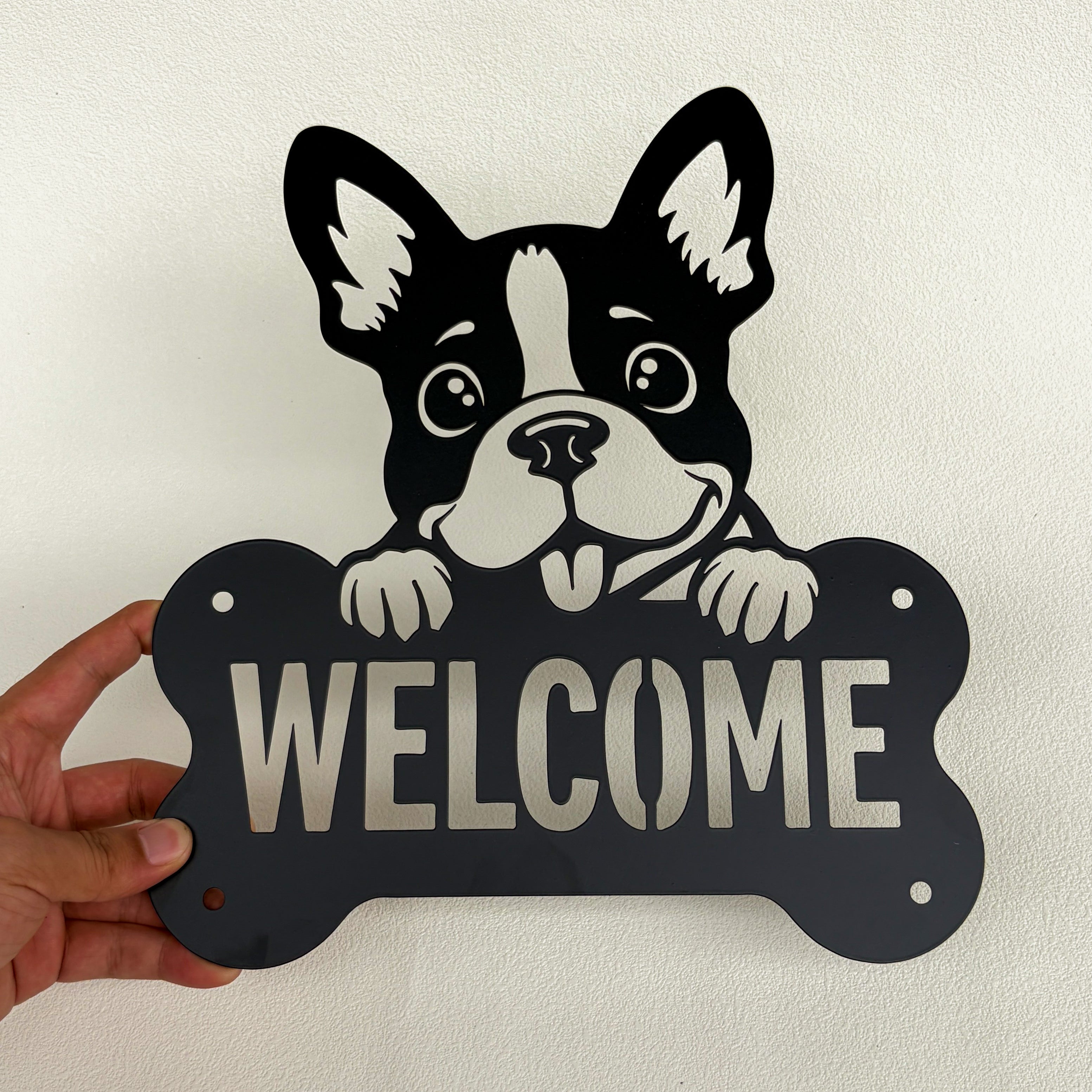 Finished black metal dog welcome wall sign after powder coating