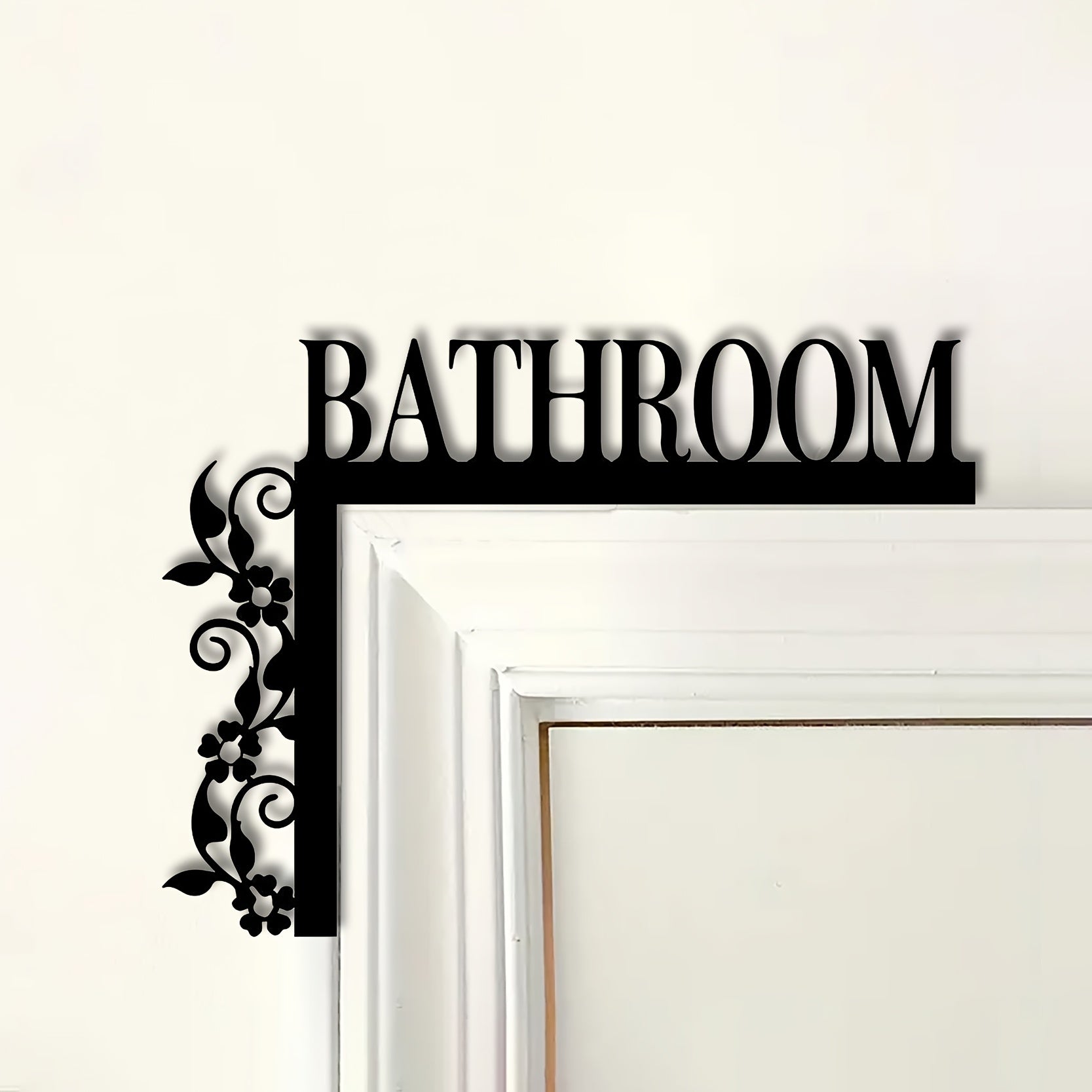 Black metal bathroom door topper sign with floral decoration