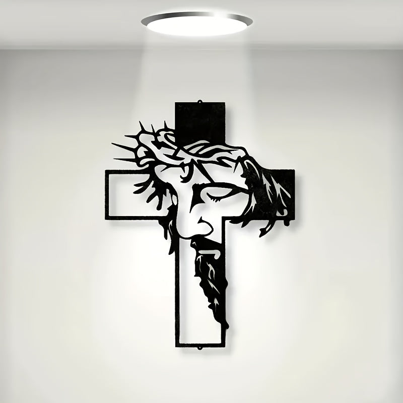 Black metal cross wall decor featuring Jesus wearing a crown of thorns